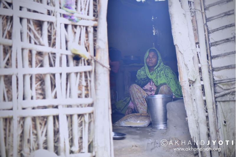 village woman cooking 